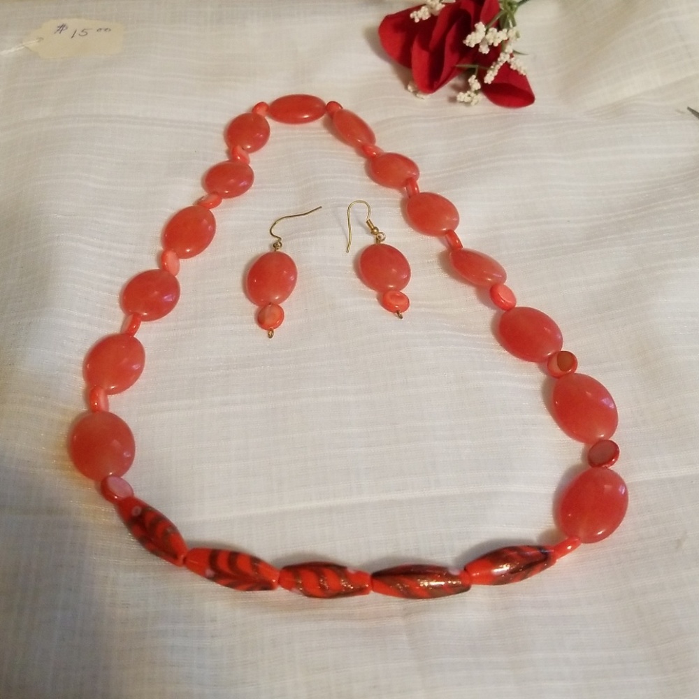 Pinkish red glass necklace and earrings